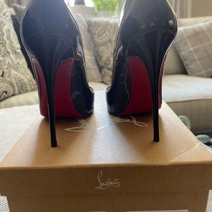 Christian Louboutin
So Kate Patent Pointed-Toe Red Sole Pump